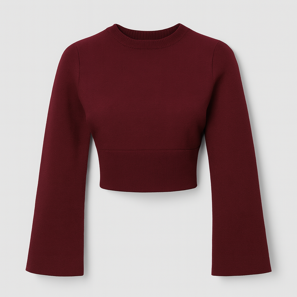 Knit cropped sweater with fitted waist and flared sleeves, styled in a modern silhouette