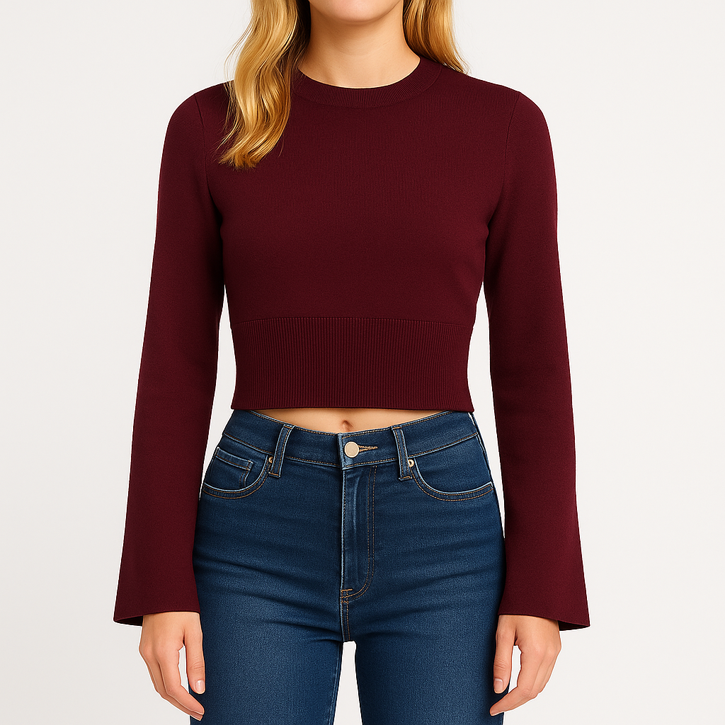 Knit cropped sweater with fitted waist and flared sleeves, styled in a modern silhouette