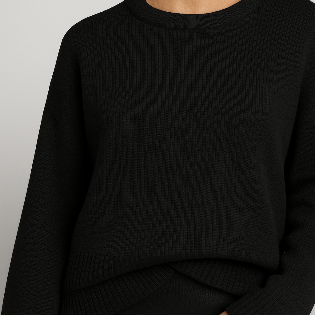 Knit oversized sweater with relaxed fit and ribbed hem, styled in a minimal silhouette
