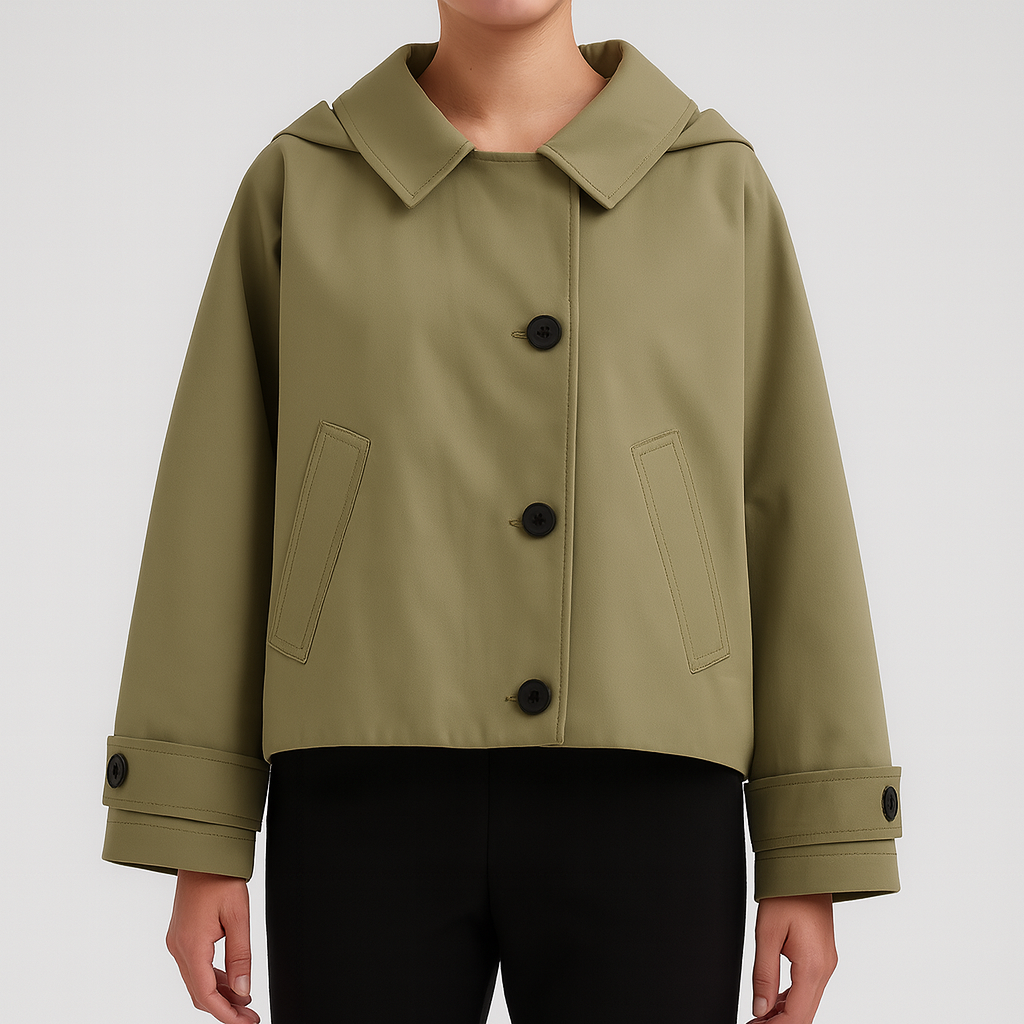 Utility-style jacket with button front and boxy fit, featuring wide cuffs and a spread collar